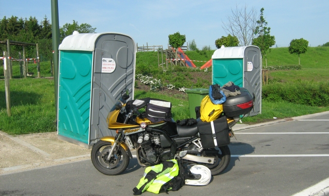 2 portaloos and a playground on what might be called belgium services